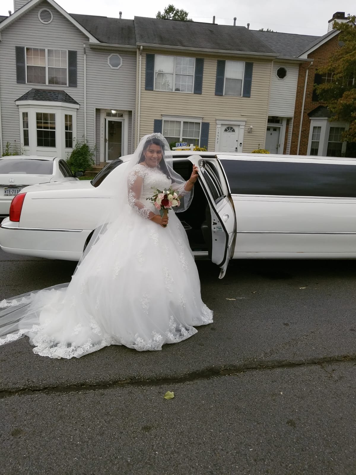 Atlas Limousine wedding limo service with elegant couple and luxury stretch limousine for special day transportation