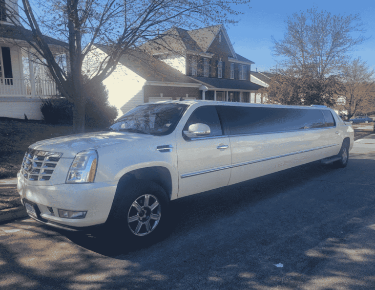 White Cadillac Escalade EXT stretch limousine by Atlas Limousine providing luxury chauffeur service in Washington DC, Virginia, and Maryland