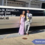 Students arriving for prom in a luxury limousine outside an elegant venue at night