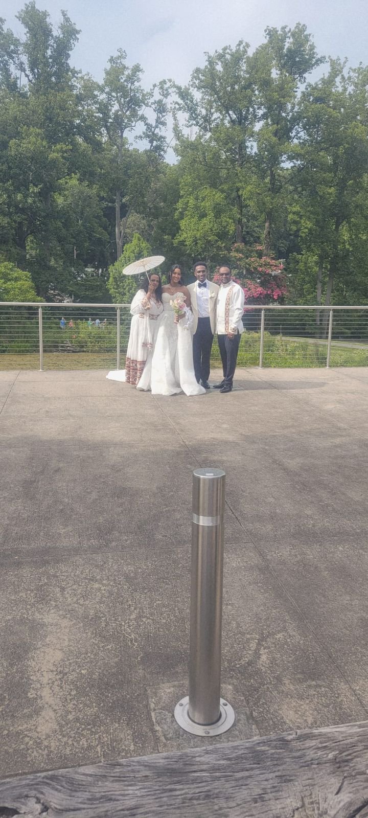 Bride and wedding party posing together during a wedding celebration